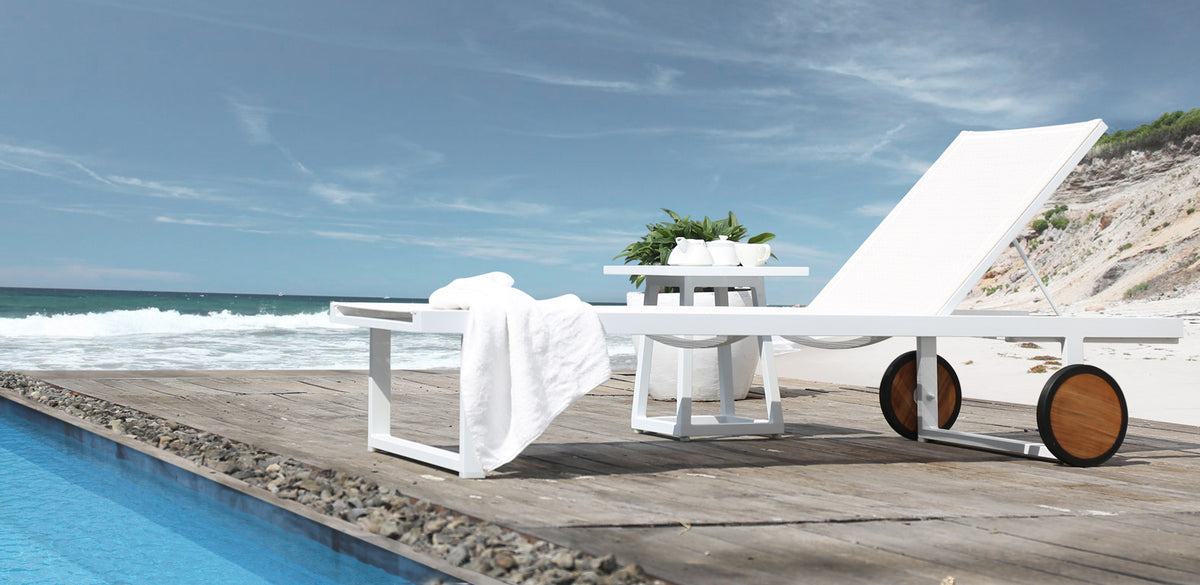 Allux Wooden Wheels Lounger by Mamagreen, showing allux wooden wheels lounger in live shot.