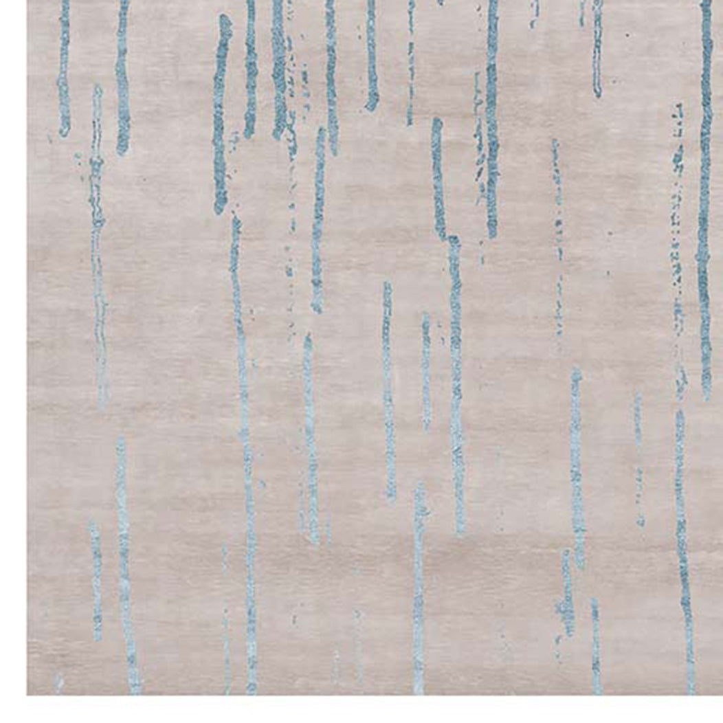Amabuki AI38 Rug by Second Studio, showing closeup view of amabuki ai38 rug by second studio in light taupe & blue.