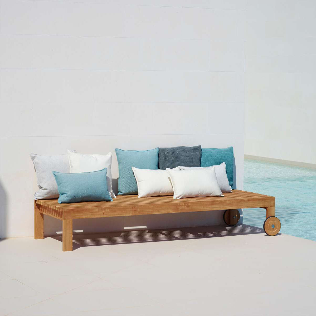 Amaze Sunbed by Cane-Line, showing amaze subed with cushions in live shot.