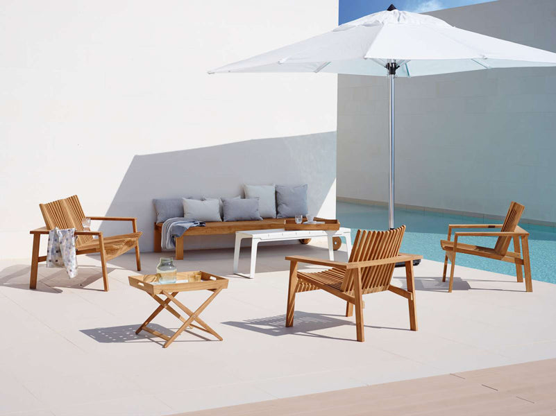 Amaze Sunbed by Cane-Line, showing amaze subed with cushions in live shot.