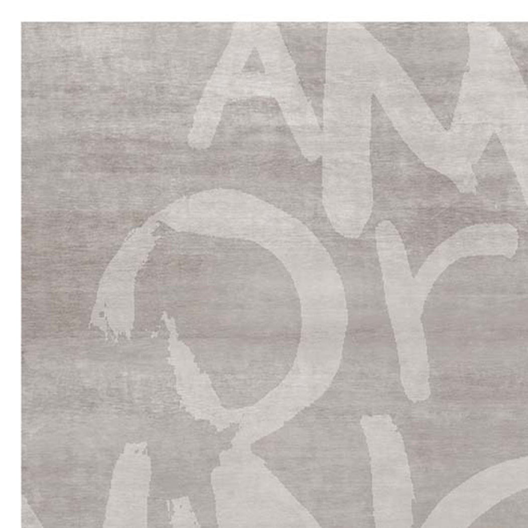 Amor Vincit Omnia AA124 Rug by Second Studio, showing closeup view of amor vincit omnia AA124 rug by second studio in taupe.