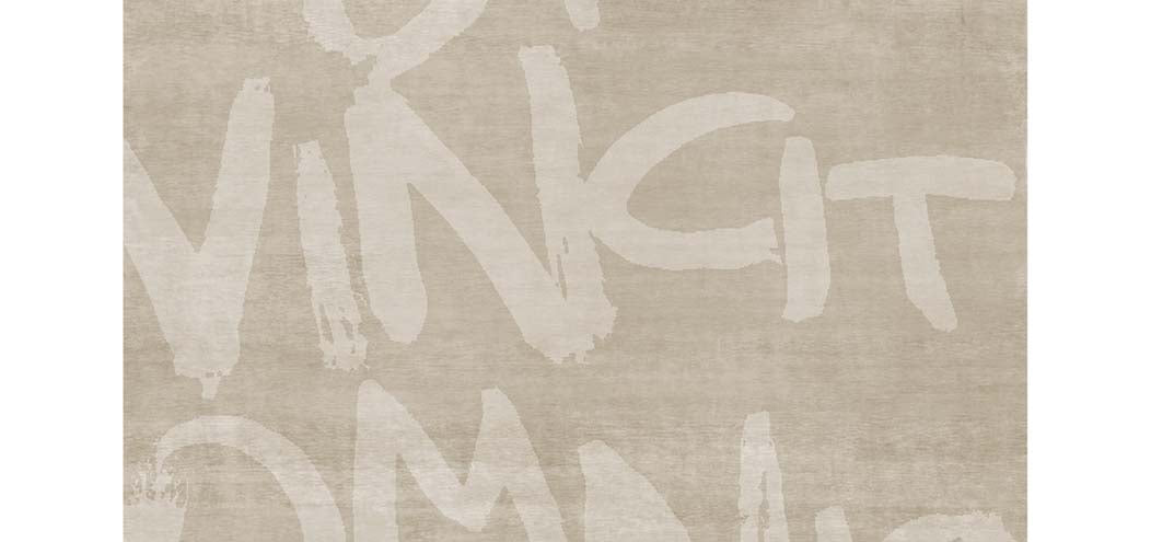Amor Vincit Omnia AA125 Rug by Second Studio, showing closeup view of amor vincit omnia AA125 rug by second studio in sand.