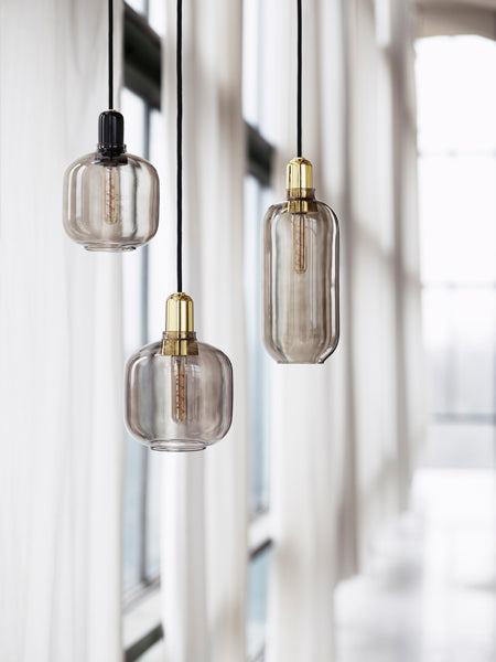 Amp Canopy by Normann Copenhagen, showing amp pendants for amp canopy in live shot.