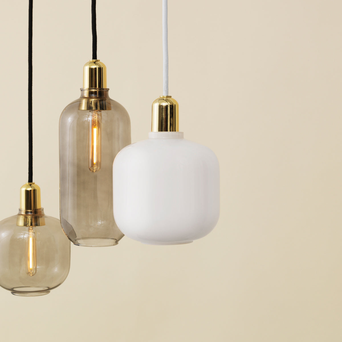 Amp Canopy by Normann Copenhagen, showing amp pendants for amp canopy in live shot.
