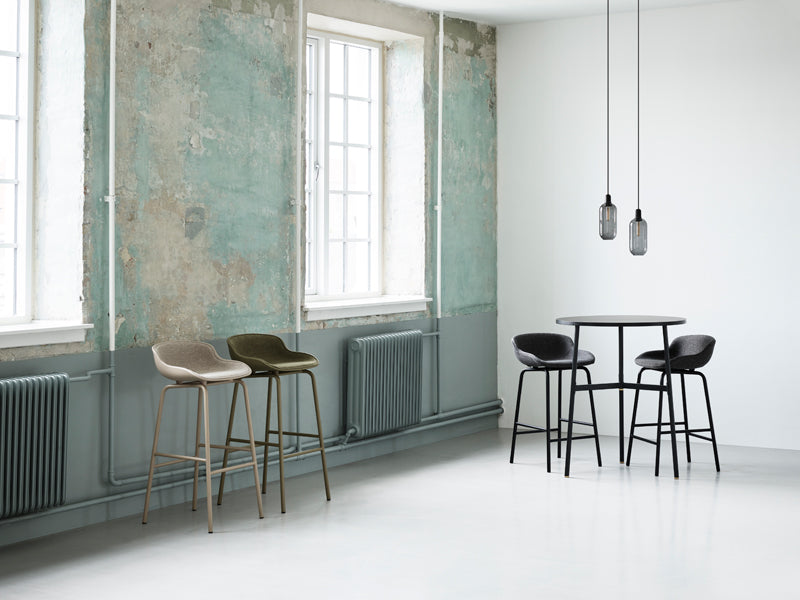 Amp Canopy by Normann Copenhagen, showing amp pendants for amp canopy in live shot.