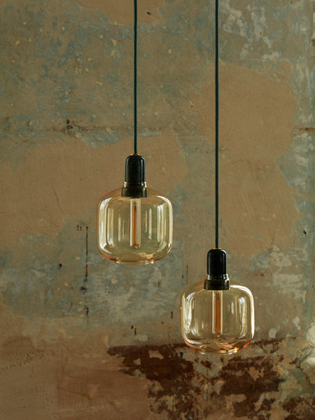 Amp Canopy by Normann Copenhagen, showing amp pendants for amp canopy in live shot.