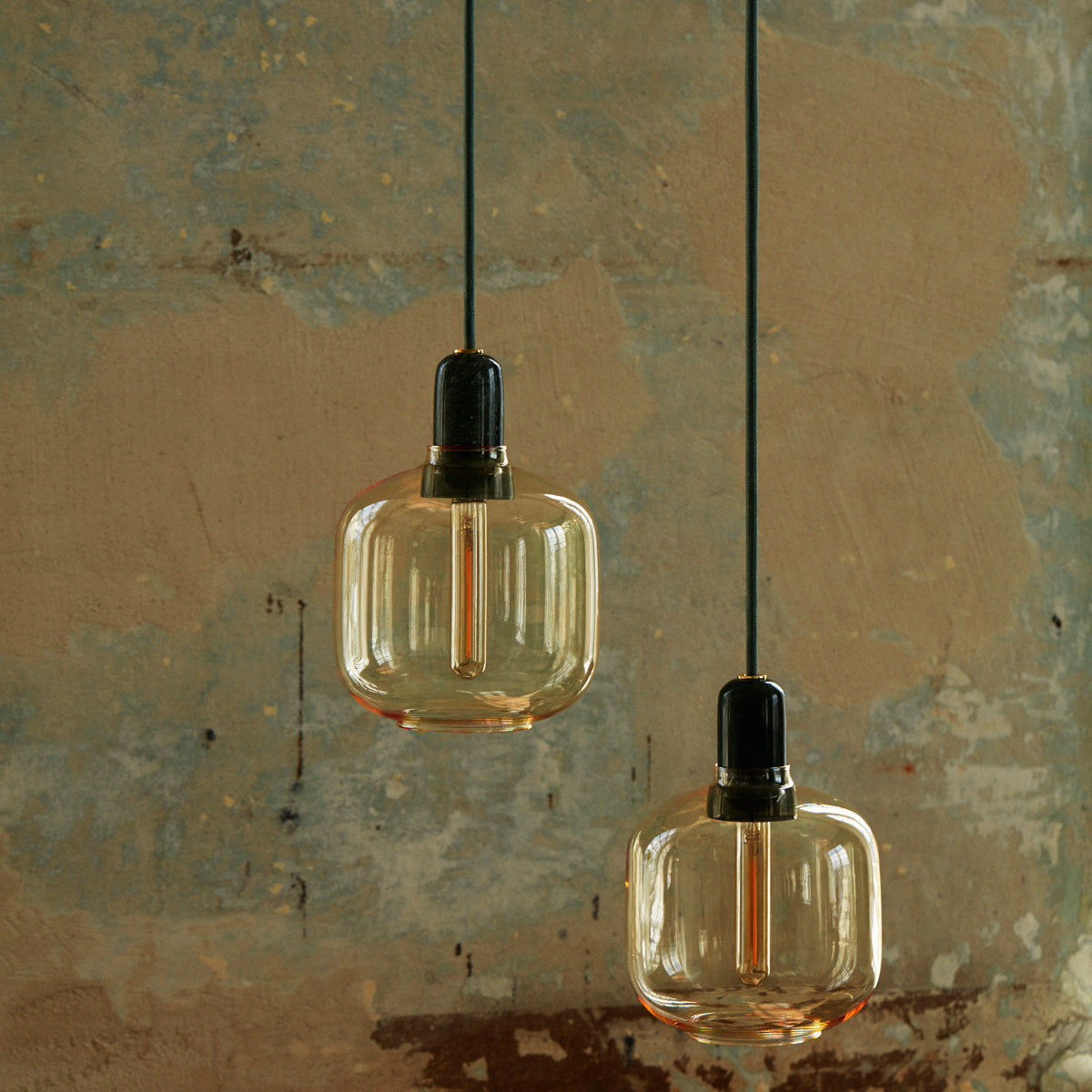Amp Cord by Normann Copenhagen, showing amp cords with lamps in live shot.