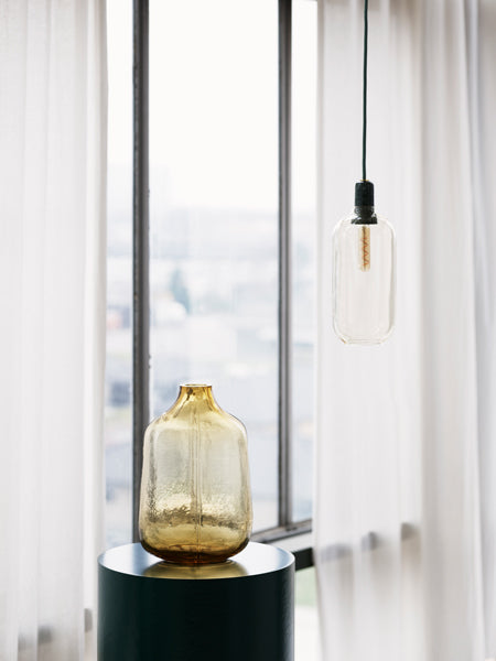 Amp Cord by Normann Copenhagen, showing amp cord with lamp in live shot.