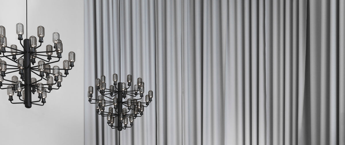 Amp US Chandelier by Normann Copenhagen, showing amp us chandeliers in live shot.