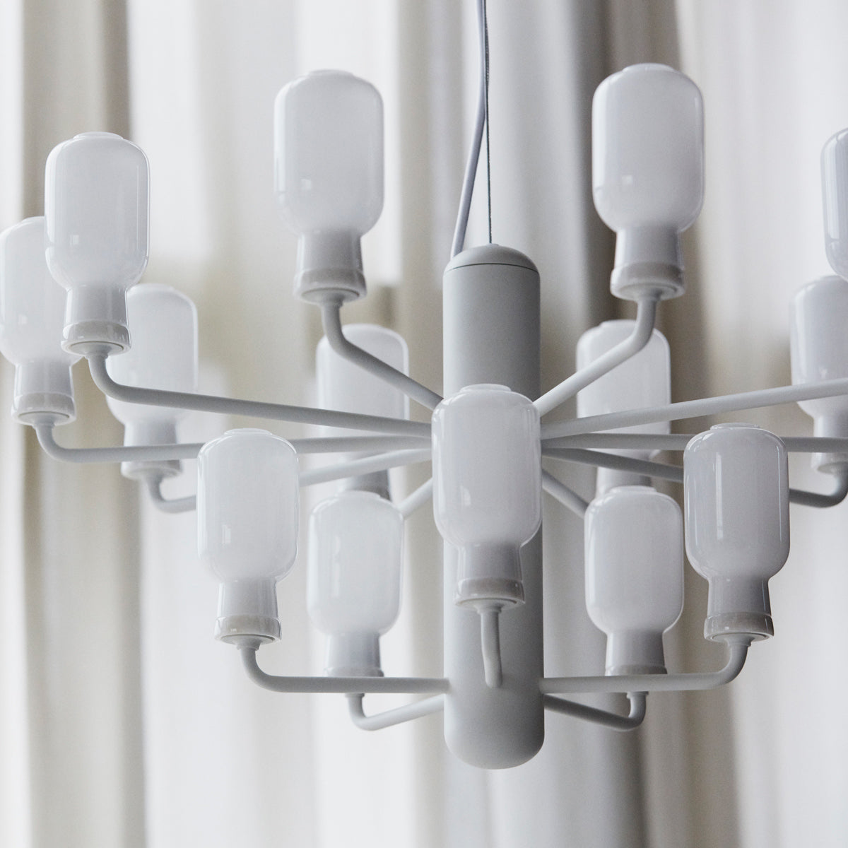 Amp US Chandelier by Normann Copenhagen, showing closeup view of amp us chandelier in live shot.