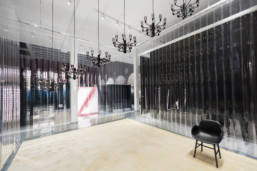 Amp US Chandelier by Normann Copenhagen, showing amp us chandeliers in live shot.
