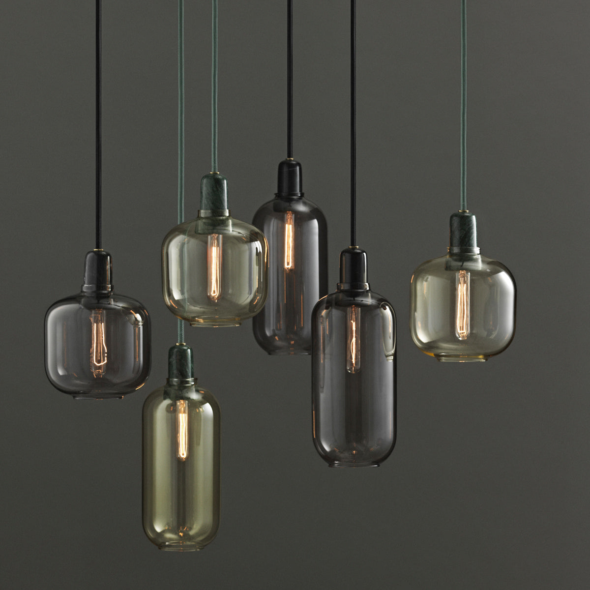 Amp US Pendant Lamp by Normann Copenhagen, showing amp us pendant lamps in live shot.