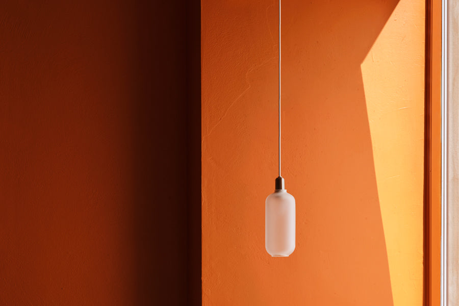 Amp US Pendant Lamp by Normann Copenhagen, showing amp us pendant lamp in live shot.