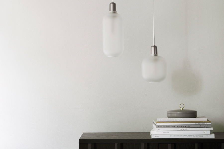 Amp US Pendant Lamp by Normann Copenhagen, showing amp us pendant lamps in live shot.