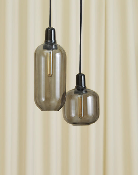 Amp US Pendant Lamp by Normann Copenhagen, showing amp us pendant lamps in live shot.