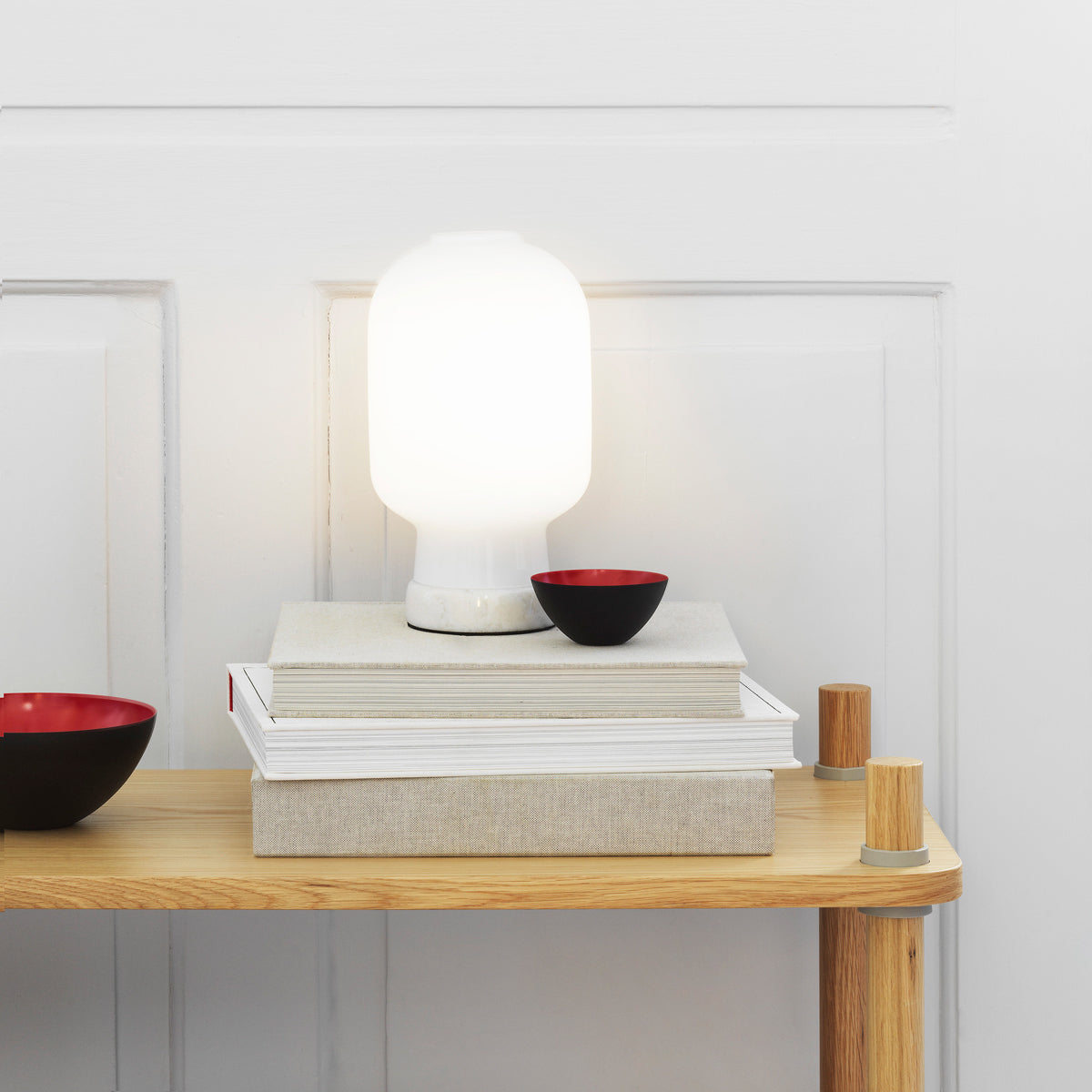 Amp US Table Lamp by Normann Copenhagen, showing amp us table lamp in live shot.