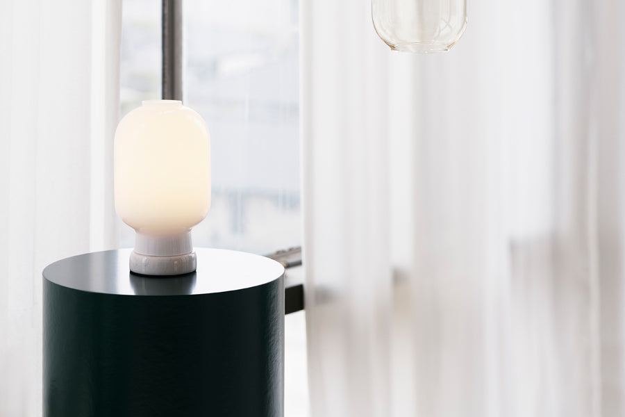 Amp US Table Lamp by Normann Copenhagen, showing amp us table lamp in live shot.