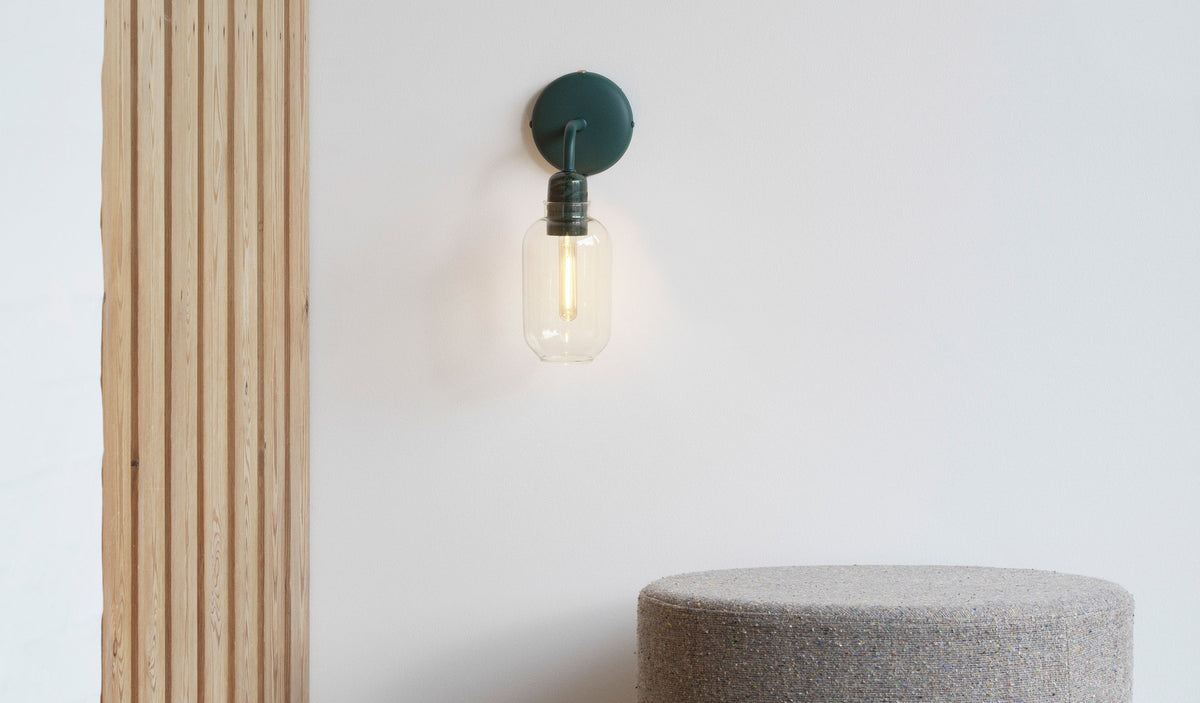 Amp US Wall Lamp by Normann Copenhagen, showing amp us wall lamp in live shot.