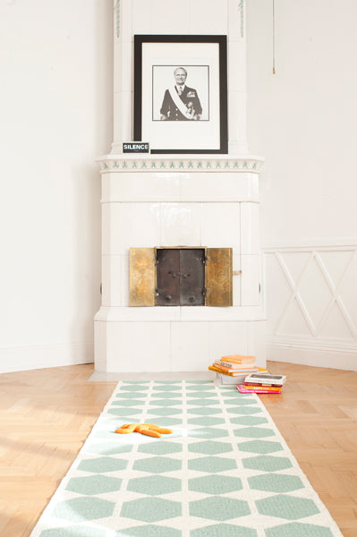 Anna Woven Plastic Rug by Brita, showing anna woven plastic rug in live shot.