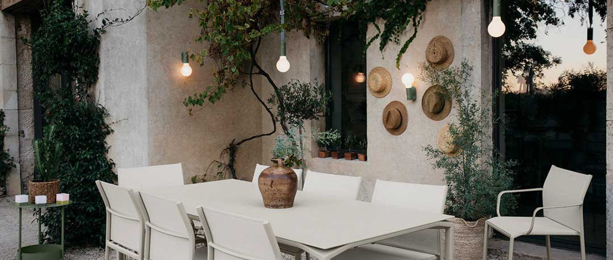 Aplo Wall Bracket by Fermob, showing of aplo wall bracket with aplo lamp in live shot.
