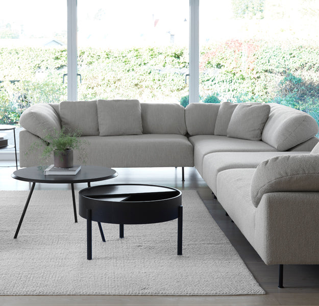 Arc Coffee Table by Woud, showing arc coffee table in live shot.