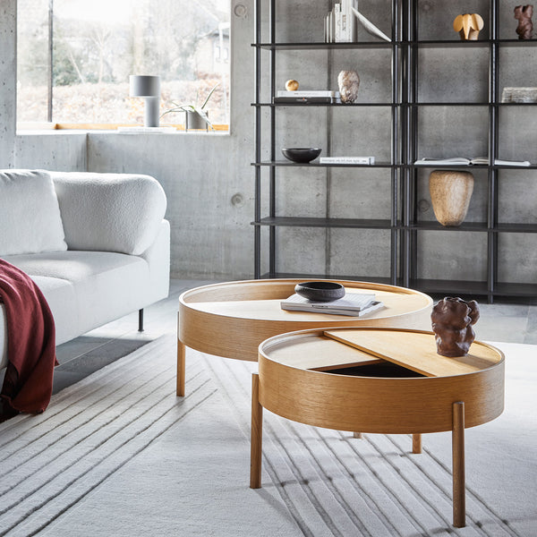 Arc Coffee Table by Woud, showing arc coffee tables in live shot.