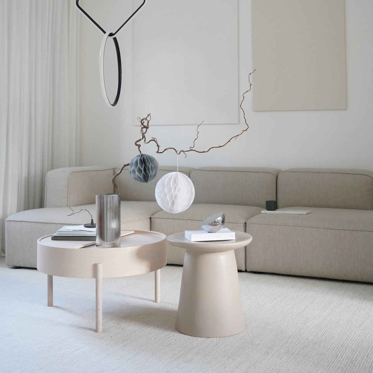 Arc Coffee Table by Woud, showing arc coffee table in live shot.