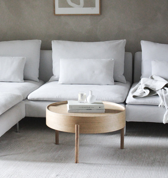 Arc Coffee Table by Woud, showing arc coffee table in live shot.
