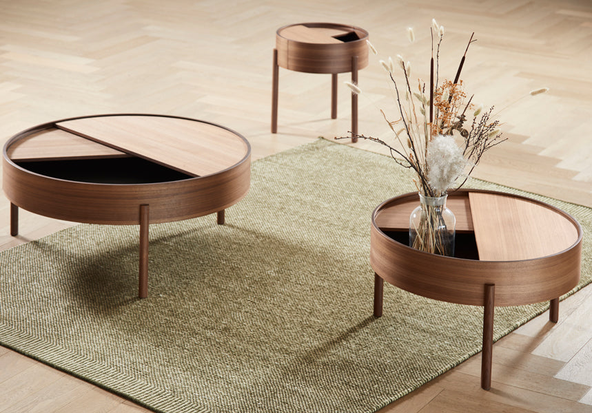 Arc Coffee Table by Woud, showing arc coffee tables in live shot.