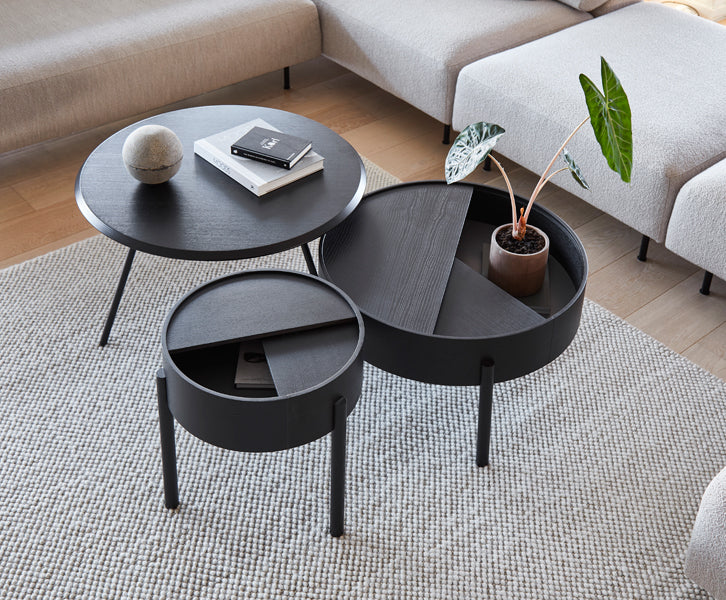 Arc Coffee Table by Woud, showing arc coffee table in live shot.