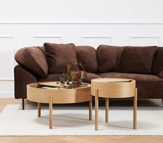 Arc Coffee Table by Woud, showing arc coffee table in live shot.