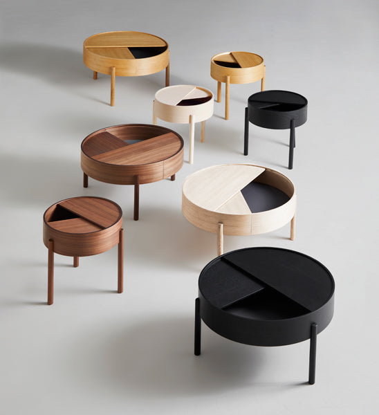 Arc Coffee Table by Woud, showing arc coffee tables in live shot.