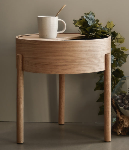 Arc Side Table by Woud, showing arc side table in live shot.