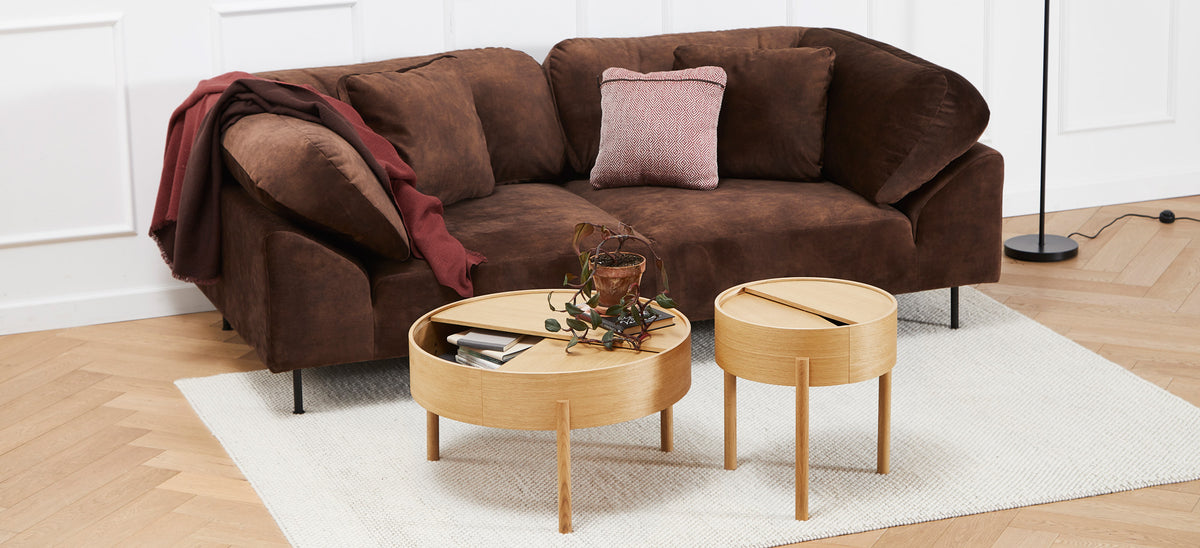 Arc Side Table by Woud, showing arc side table in live shot.