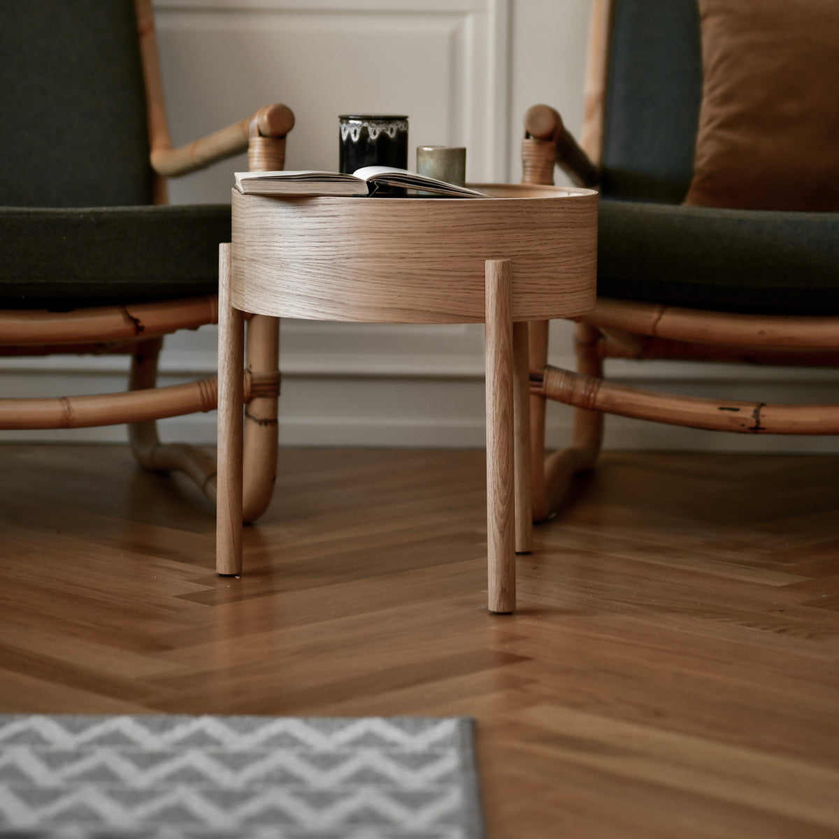 Arc Side Table by Woud, showing arc side table in live shot.