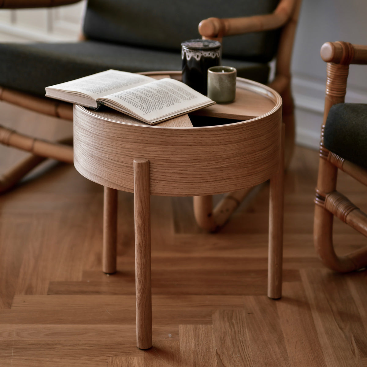 Arc Side Table by Woud, showing arc side table in live shot.