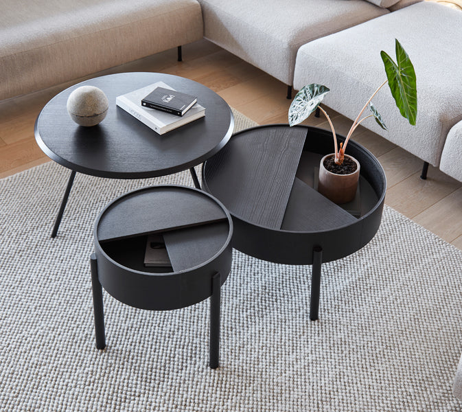 Arc Side Table by Woud, showing arc side table in live shot.