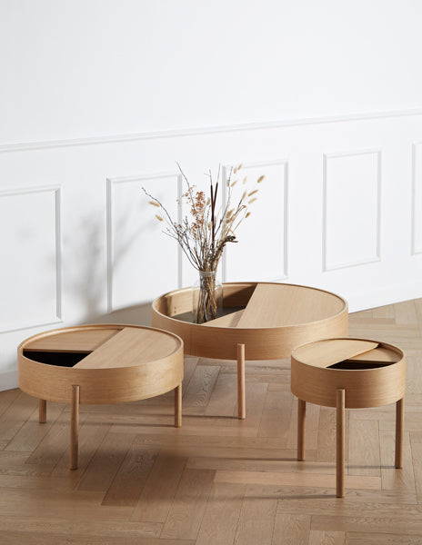 Arc Side Table by Woud, showing arc side table in live shot.