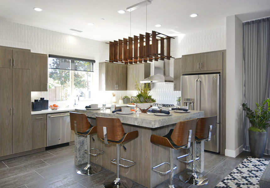 Arca LED Linear Pendant by Cerno, showing arca led linear pendant with stools in live shot.
