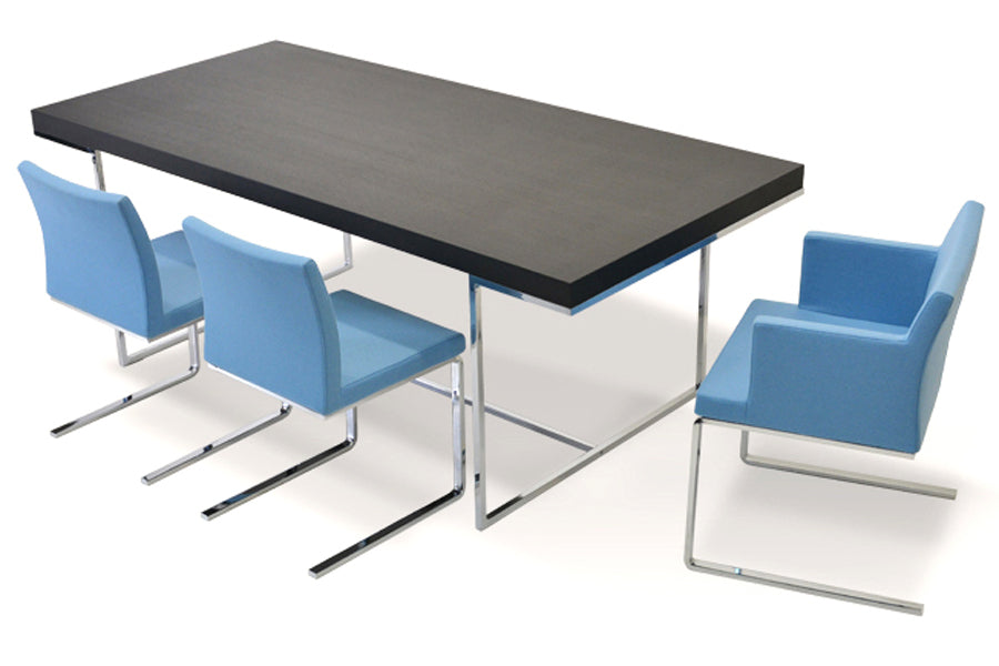 Aria Flat Chair by SohoConcept, shown in sky blue wool with madrid dining table.
