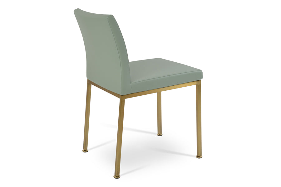 Aria Metal Adjuster Cap Chair by SohoConcept, showing side view of aria metal adjuster cap chair in brass/mint ppm-s.