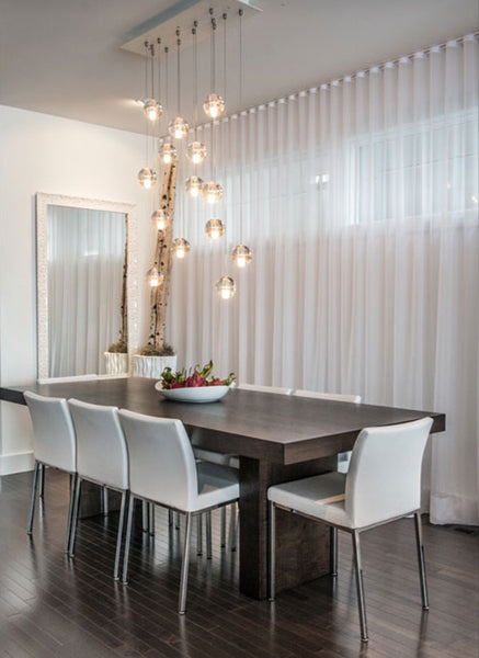 Aria Metal Dining Chair by SohoConcept, showning metal dining chairs in live shot.