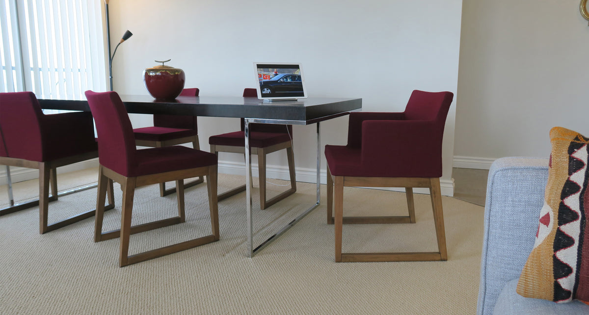 Aria Sled Wood Dining Chair by SohoConcept, showing sled wood chairs in live shot.