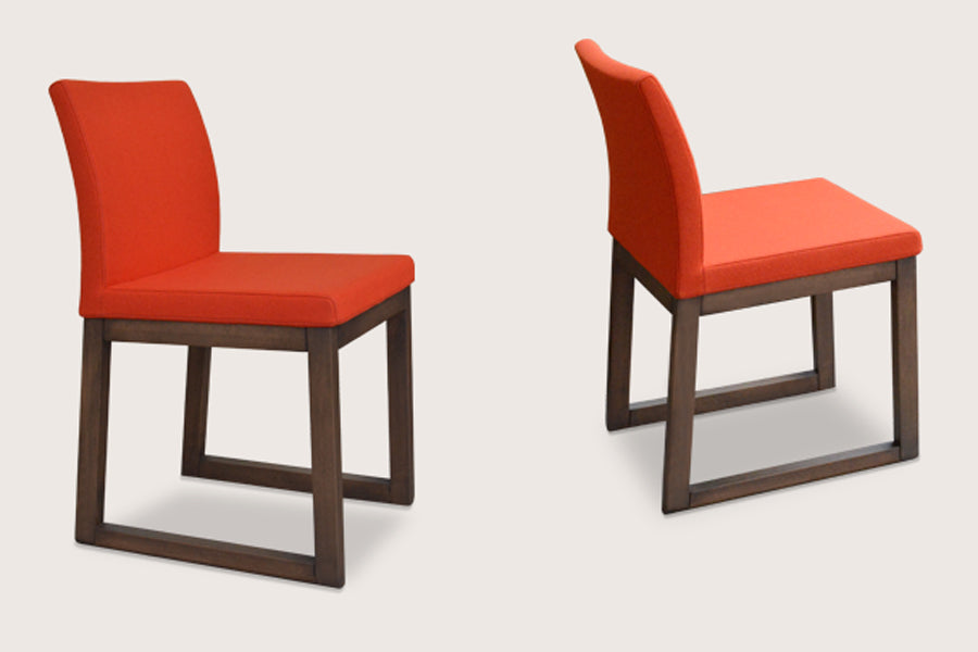 Aria Sled Wood Dining Chair by sohoConcept, shown in red wool.