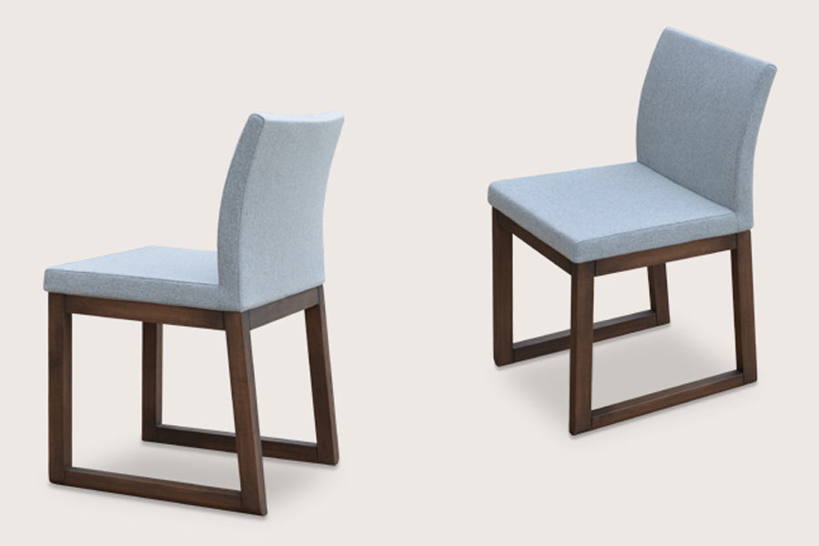 Aria Sled Wood Dining Chair by sohoConcept, shown in silver camira wool.