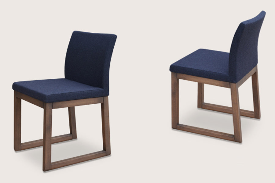 Aria Sled Wood Dining Chair by sohoConcept, shown in charcoal wool.