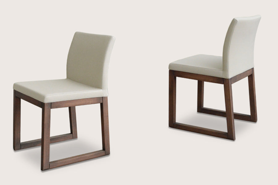 Aria Sled Wood Dining Chair by sohoConcept, shown in bone PPM wool.