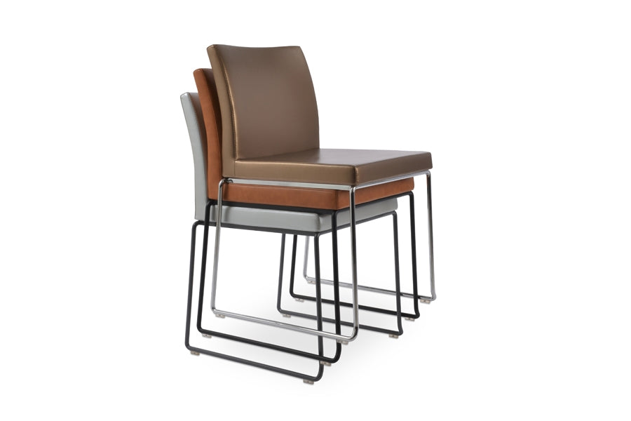 Aria Stackable Dining Chair by sohoConcept, showing group of chairs.