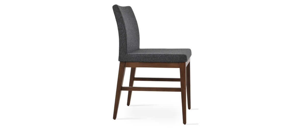 Aria Wood Stretcher Dining Chair by SohoConcept, showing side view of aria wood stretcher dining chair in beech walnut wood/camira blazer dark grey wool.