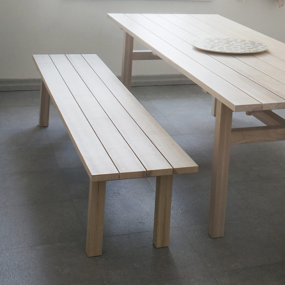 Arkipelago KVI10 Indoor/Outdoor Bench by Nikari, showing arkipelago kvi10 indoor/outdoor bench in live shot.